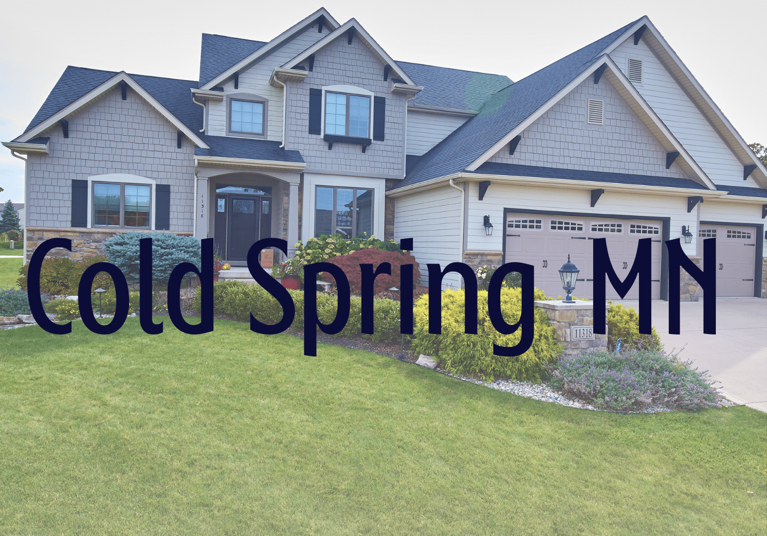 A large house with the words " old spring manor ".